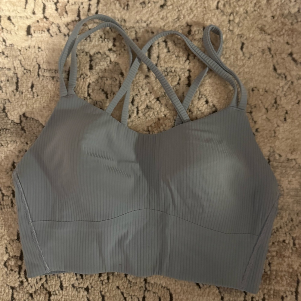 Light blue lululemon sports bra has matching leggings listed on page